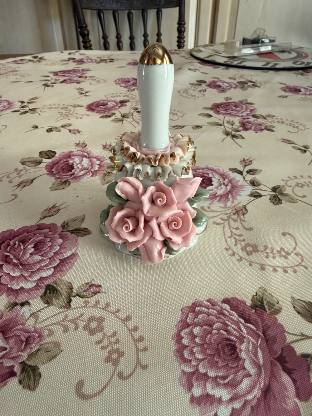 Vintage porcelain bell with roses